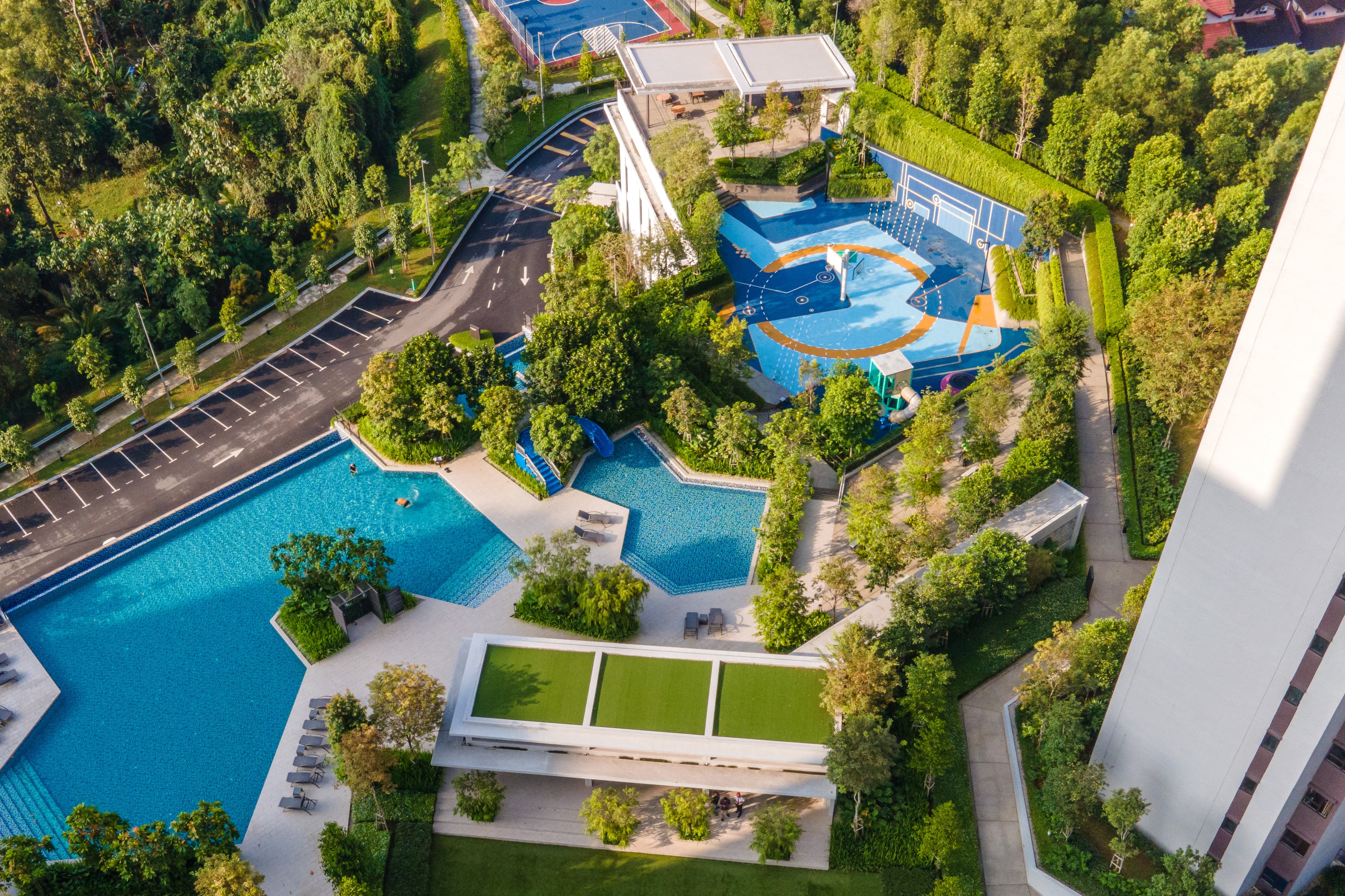 Construction crew smoothing concrete on site with machinery and equipment